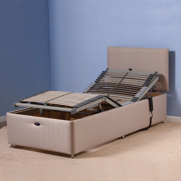 Restwell Richmond Electric Bed with mattress on carpeted floor, front view.