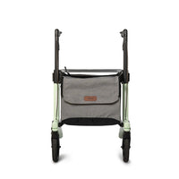 Mint green Rollz Air Carbon Fibre Rollator with grey fabric bag between wheels, front view.