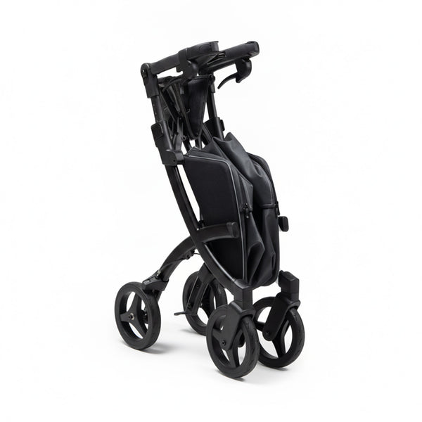Rollz Flex 2-in-1 rollator and shopping trolley folded on four wheels, white background, side view.
