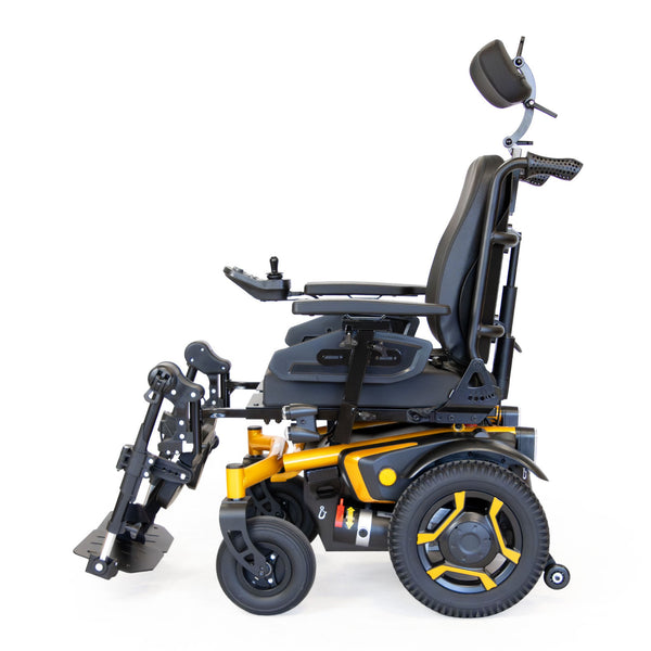 Roma P400 Powerchair with adjustable seat, headrest and rear-wheel drive, side view.