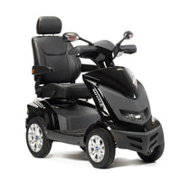 Drive Royale 4 Scooter with adjustable padded seat, headrest, armrests and rear-view mirrors, front angle view.
