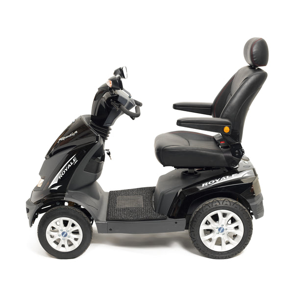 Drive Royale 4 Scooter with adjustable padded seat, armrests, headrest and four wheels, side view.
