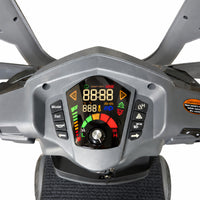 Drive Royale 4 Sport Scooter dashboard showing buttons, central dial and digital display for speed and battery level, close-up view.