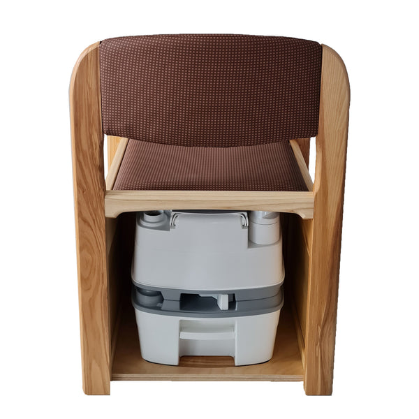 Royale Flushing Commode by Gordon Ellis with hardwood frame and cushioned seat, rear view on white background.