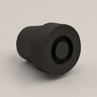Able2 Rubber Walking Stick Ferrule 16mm, cylindrical with flat top, on a light plain surface, front view.