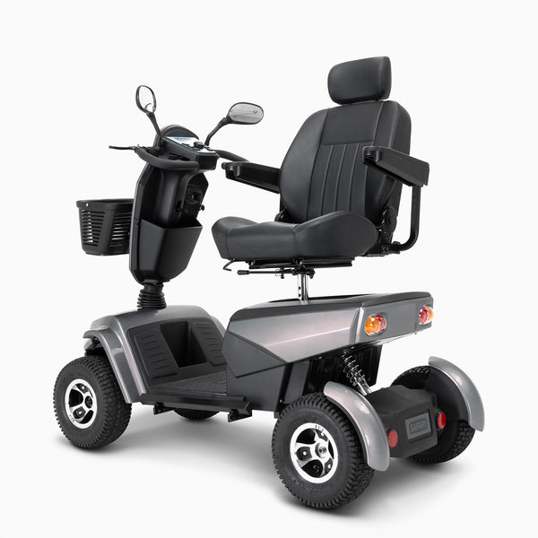Drive Safari Scooter with 4 wheels, pneumatic tyres, black cushioned seat, armrests, mirror and front basket, side view.