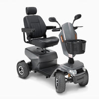 Drive Safari Scooter with padded seat, armrests, basket, mirrors, four wheels and suspension, front angle view.