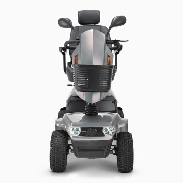 Drive Safari Scooter with all-round suspension, four pneumatic tyres, basket, handlebars and padded headrest, front view.