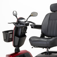 Drive Safari Scooter with armrests, handlebars, mirrors, basket and all-round suspension, close-up view.