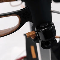 Saljol Allround Bariatric Rollator handlebar with bell, ergonomic grip and all-terrain tyres, close-up view.