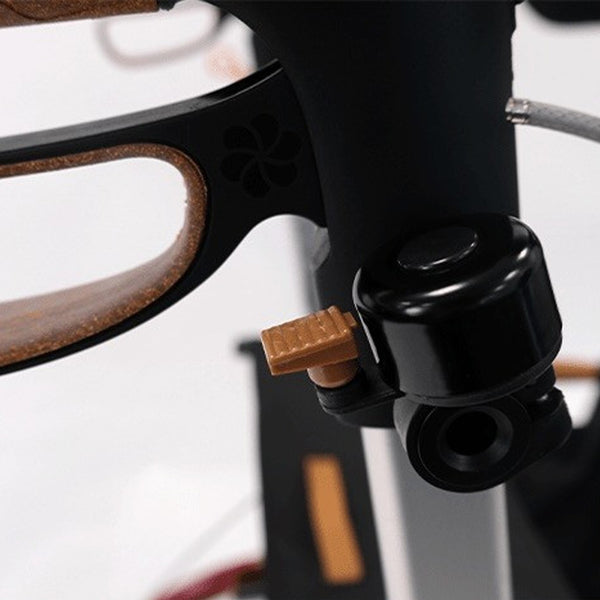 Saljol Allround Bariatric Rollator handlebar with bell, ergonomic grip and all-terrain tyres, close-up view.