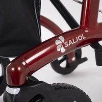 Saljol Allround Bariatric Rollator frame with logo and all-terrain tyres, close-up view.