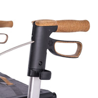 Saljol Bariatric Carbon Rollator handle with grip, brake lever and cable on white background, close-up.