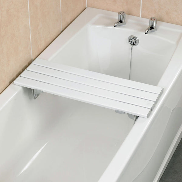 Savanah Slatted Bath Board with reinforced plastic slats across a bathtub, silver taps and tiled background, top view.