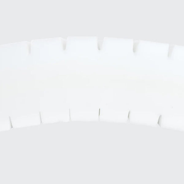 Curved row of interlocking segments from the Opera Beds Serene Profiling Mattress on a plain background, angled view.