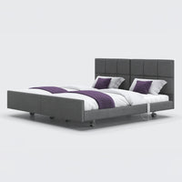 Opera Beds Signature Comfort Dual Profiling Bed with adjustable settings and padded headboard, front view.
