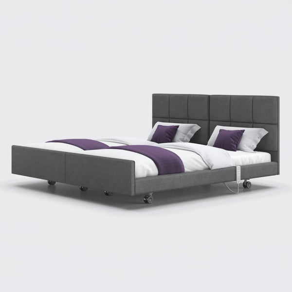 Opera Beds Signature Comfort Dual Profiling Bed with adjustable settings and padded headboard, front view.