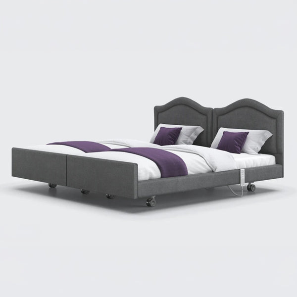 Opera Beds Signature Comfort Dual Profiling Bed with two headboards and white bedding with purple accents, front view.