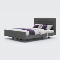Opera Beds Signature Comfort Dual Profiling Bed with white bedding and purple accents on a plain background, front view.