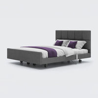 Opera Beds Signature Comfort Dual Profiling Bed with white bedding and purple accents on a plain background, front view.