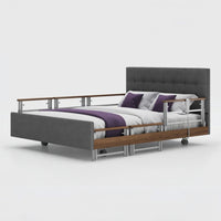 Opera Beds Signature Comfort Plus Dual Profiling Bed with wooden accents and purple bedding on a white background, front view.