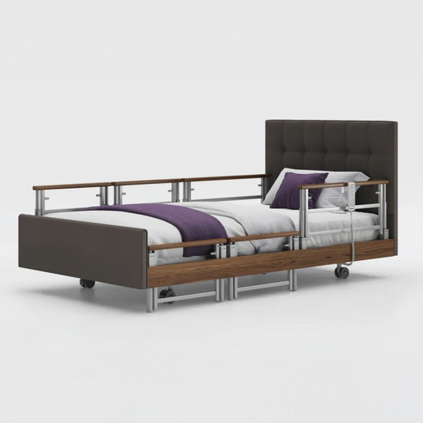 Signature Comfort Plus Profiling Bed by Opera Beds with leatherette frame, side rail, white bedding and purple blanket, front view.
