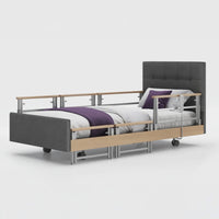 Opera Beds Signature Comfort Plus Profiling Bed with adjustable side rail, white background, front view.