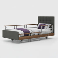 Opera Beds Signature Comfort Plus Profiling Bed with adjustable side rails and purple bedding, front view.