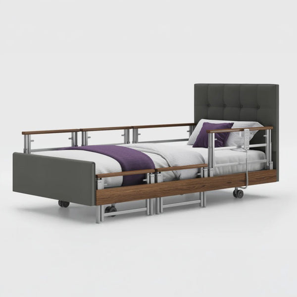 Opera Beds Signature Comfort Plus Profiling Bed with adjustable side rails and purple bedding, front view.