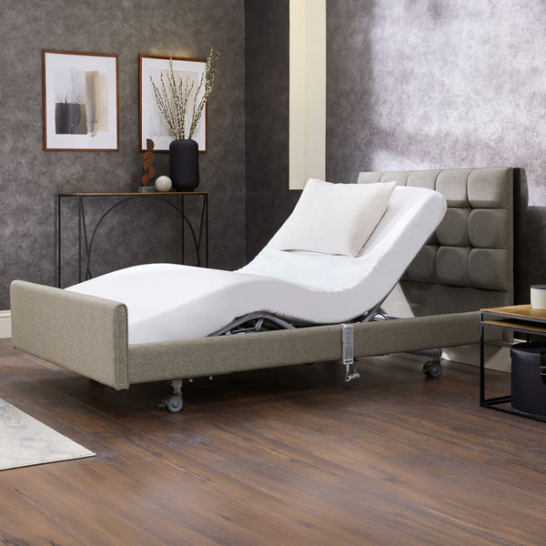 Opera Beds Signature Comfort Profiling Bed with adjustable base, shown in bedroom setting, front view.