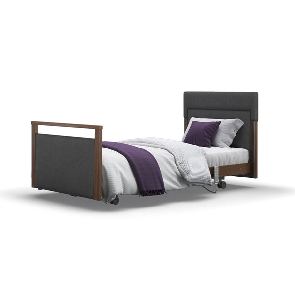 Opera Beds Signature Upholstered Profiling Bed with white bedding and purple accents on white background, front view.