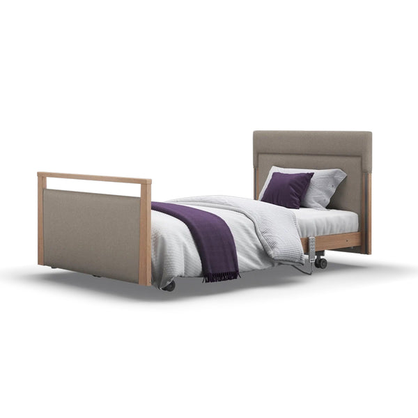 Opera Beds Signature Upholstered Profiling Bed, adjustable with wheels, linen fabric, white bedding, purple accents, side view.