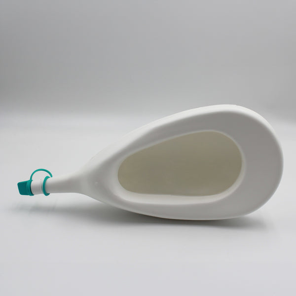 Homecraft Slipper Urinal with teal cap, plastic design, shown lying on its side on plain white background, side view.