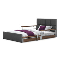 Opera Beds Solo Comfort Plus Profiling Floor Bed with white bedding, purple blanket and pillow, side view.