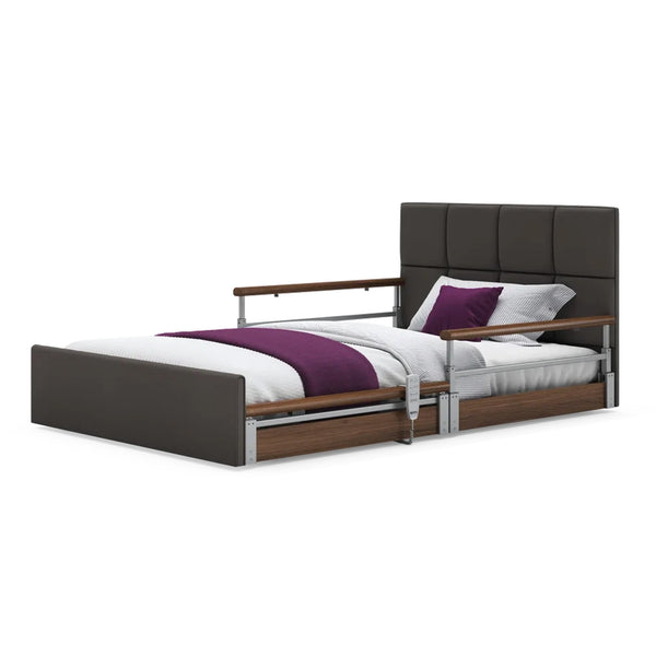 Opera Beds Solo Comfort Plus Profiling Floor Bed with side rails, brown leatherette frame, white bedding, purple accents, front view.