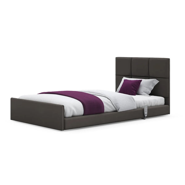 Solo Comfort Profiling Floor Bed with tall headboard, white bedding and purple accents, front view.