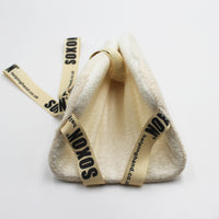 Helping Hand Soxon sock and stocking aid, triangular with easy-to-use straps and branded towel, front view.