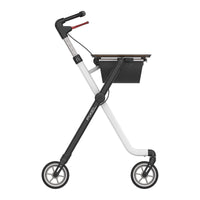 Rehasense Space I Indoor Rollator with four wheels, height adjustable handles and basket under handlebar, front view.