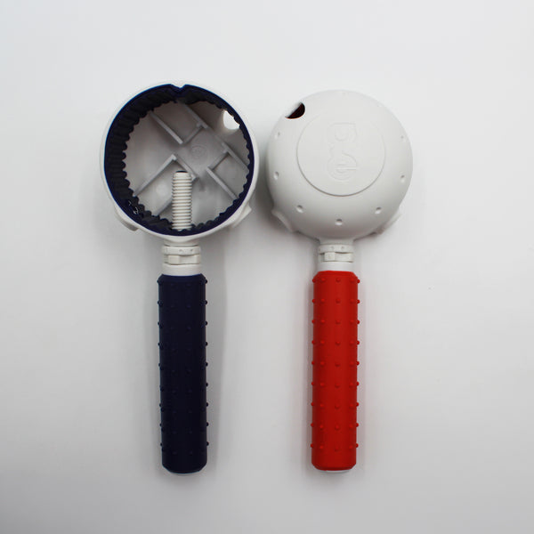 Gordon Ellis tap turners, one open and one closed, with round white tops on a plain white background, front view.