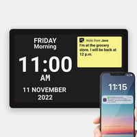 Idem Digital Dementia Clock by Ravencourt displaying time, date, reminders, and a phone with 11:15 on screen, front view.