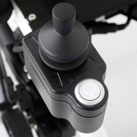 Dash Rehab TODO Drive Power Assist joystick control panel with power button for electric wheelchairs, close-up.