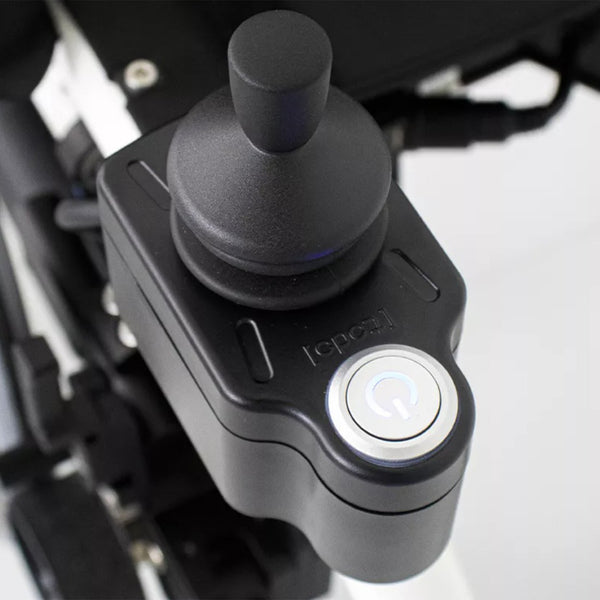 Dash Rehab TODO Drive Power Assist joystick control panel with power button for electric wheelchairs, close-up.