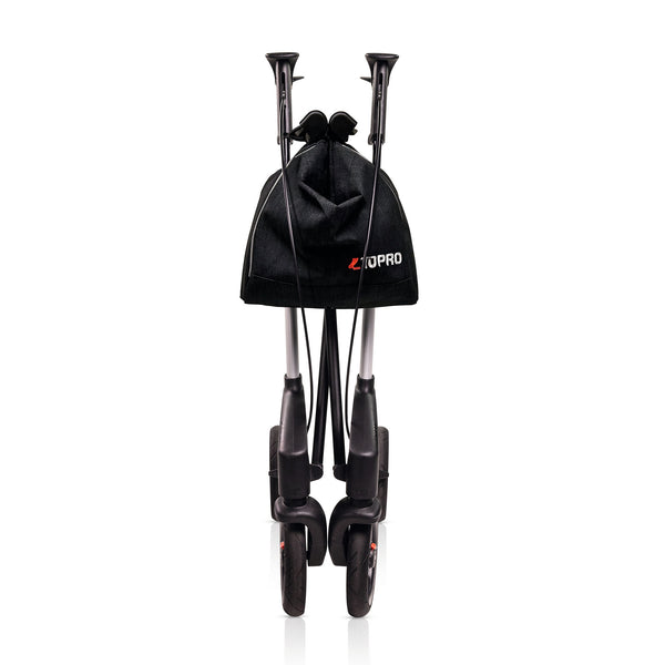 Folded Topro Troja 5G Premium Rollator with wheels and black storage bag, side view.