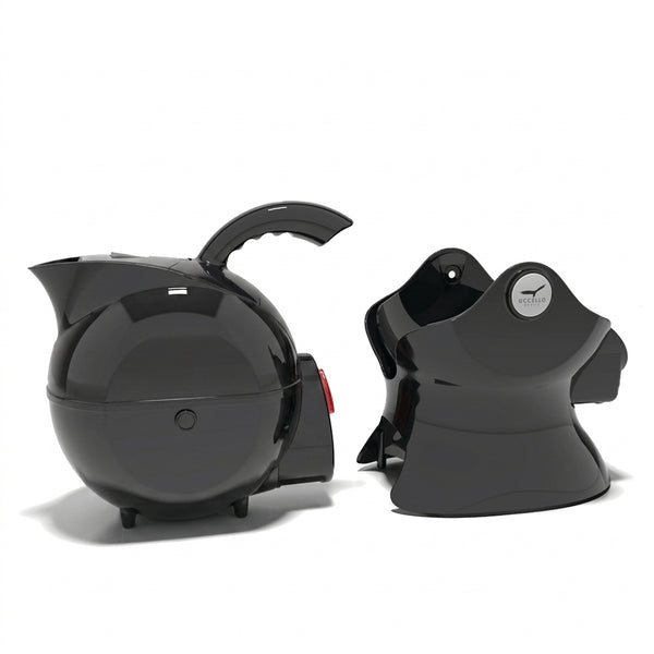 Pair of Uccello Kettle by Uccello Designs with ergonomic handles and distinctive shapes on a white background, front view.