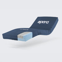 Opera Beds Ultimate Profiling Mattress with antimicrobial cover, foam layers visible for pressure sore prevention, side view.