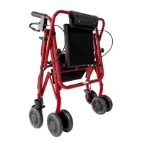 Uniscan Glider Plus Adjustable Rollator folded with four black wheels, padded seat and folding backrest, side view.