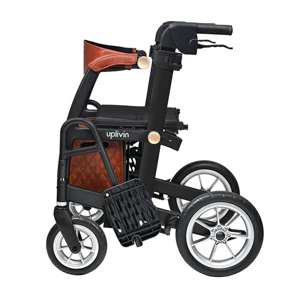 Able2 Uplivin Glide 2-in-1 rollator and wheelchair folded, showing large wheels, seat, and hand brakes, side view.