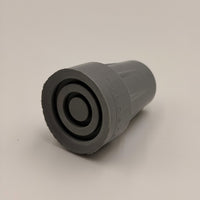 Coopers Walking Stick Ferrule with circular grooves, lying sideways on a plain background, side view.