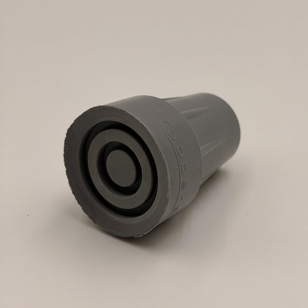 Coopers Walking Stick Ferrule with circular grooves, lying sideways on a plain background, side view.