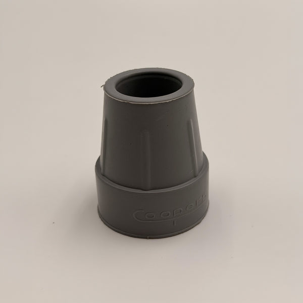 Coopers Walking Stick Ferrule, heavy-duty rubber tip with ridged sides and smooth round opening for walking aid, close-up view.